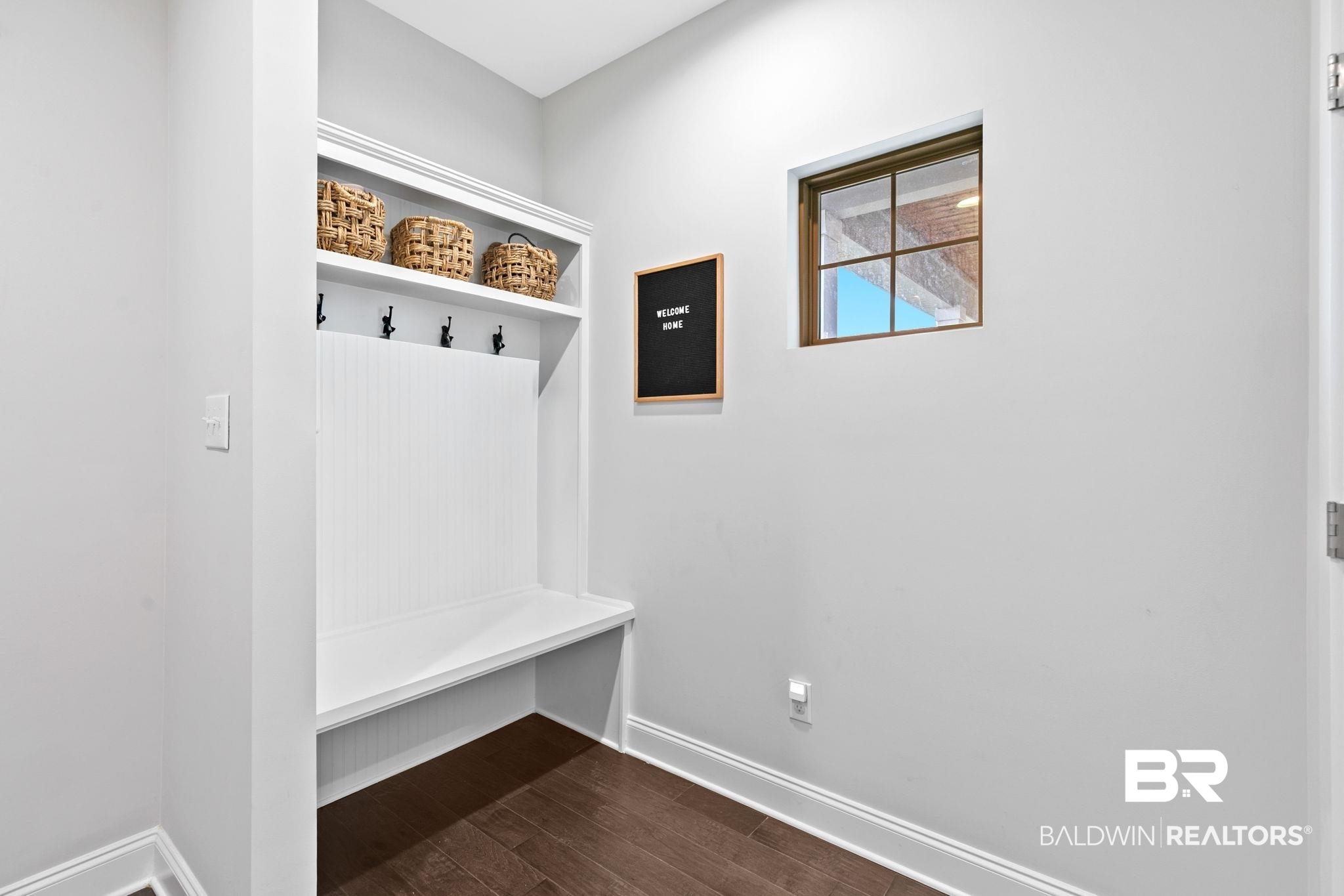 13233 Ibis Boulevard Daphne, AL 36527 - Photo 51 of 100 Built-in mudroom bench with upper shelving and coat hooks