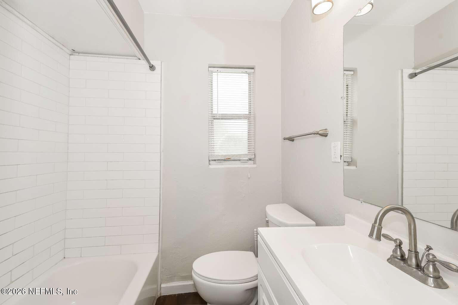 1480 Stimson Street Jacksonville, FL 32205 - Photo 14 of 21 a bathroom with a sink a toilet and shower