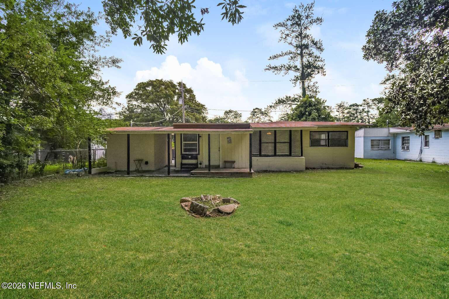 1480 Stimson Street Jacksonville, FL 32205 - Photo 19 of 21 a view of a house with a backyard