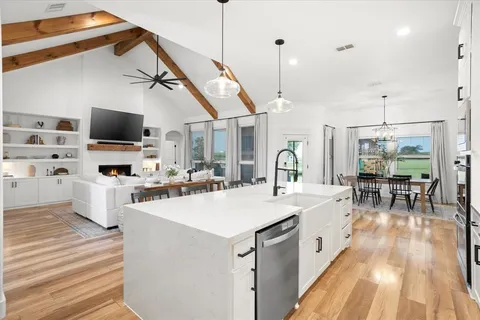 a view of living room with furniture and flat screen tv
