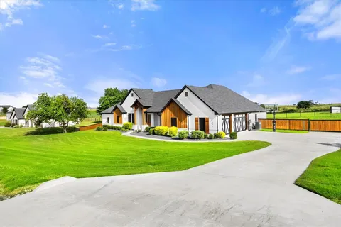 a view of house with outdoor space and street view