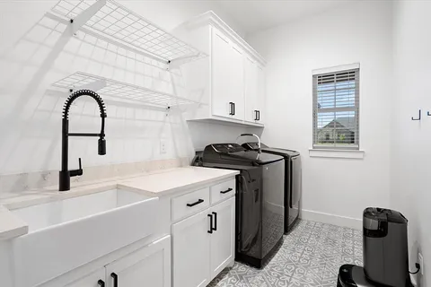 a kitchen with a stove and a sink