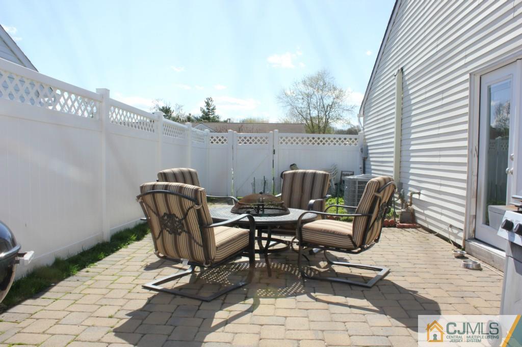 19 Rainford Road Edison, NJ 08820 - Photo 14 of 16 a view of a chairs and table in patio