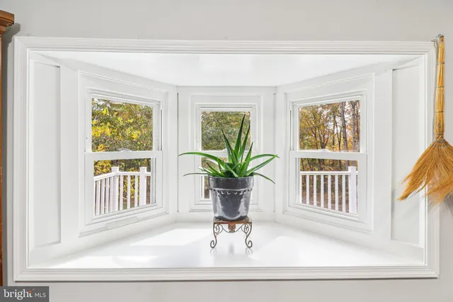 a kitchen with a sink stainless steel appliances and cabinets