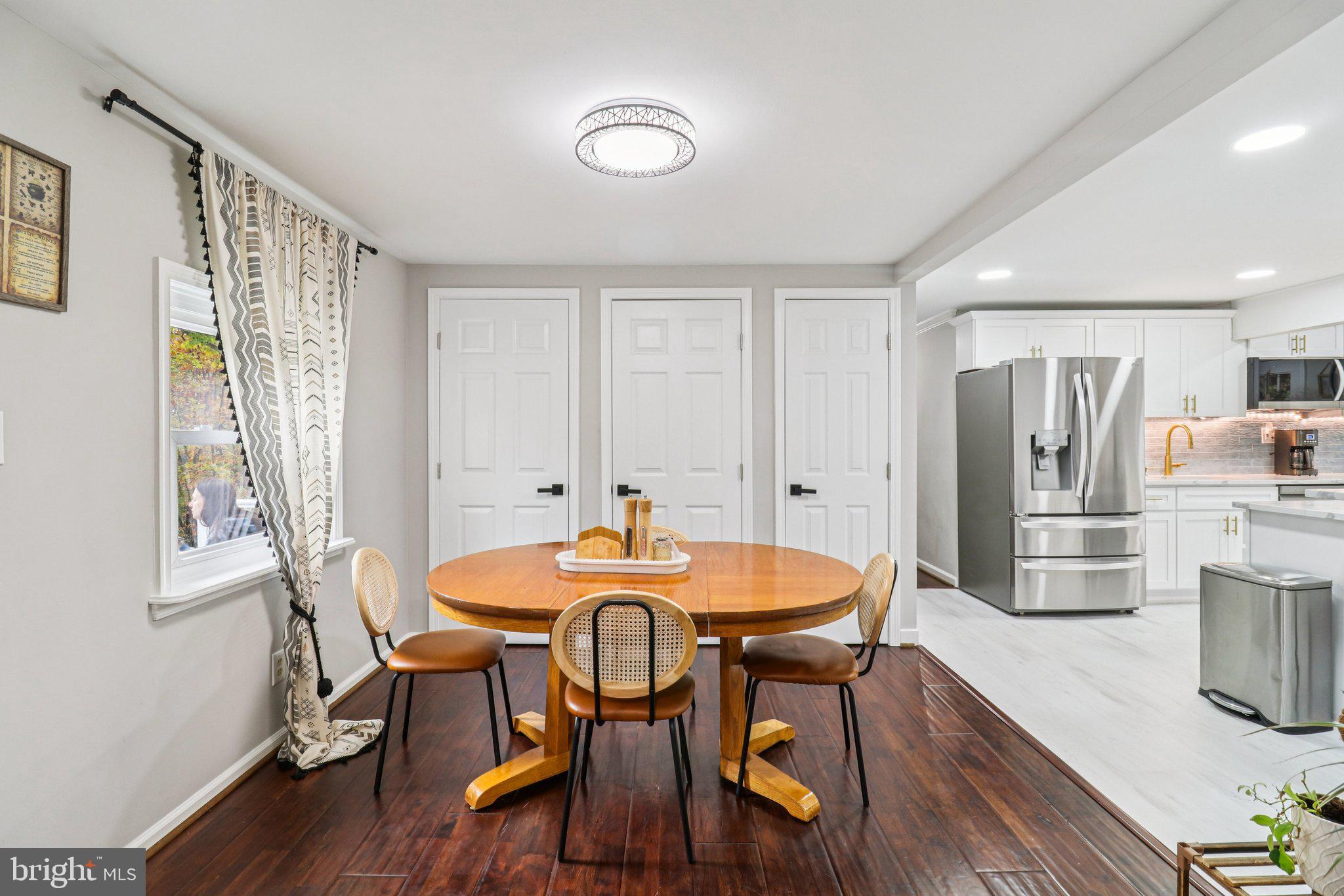 9830 Wineberry Road Marshall, VA 20115 - Photo 21 of 105 a view of a dining room with furniture and wooden floor