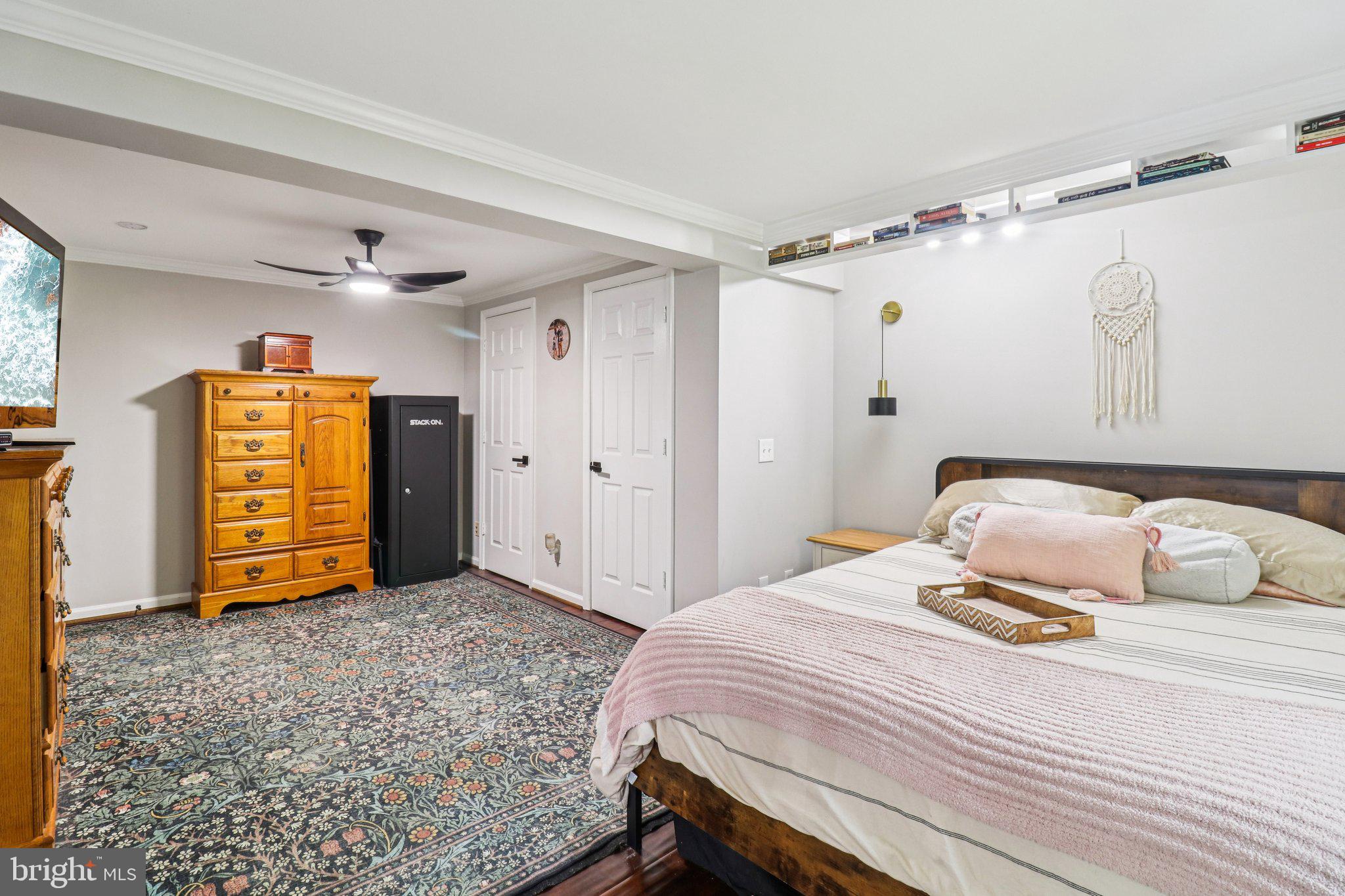 9830 Wineberry Road Marshall, VA 20115 - Photo 35 of 105 a bedroom with a bed and a chair