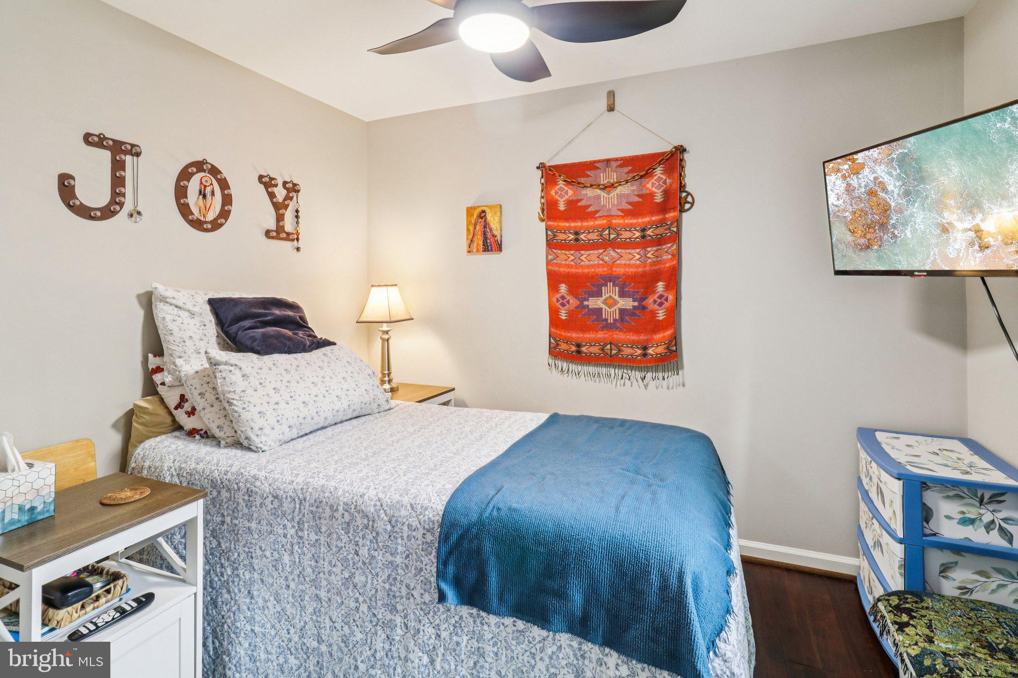 9830 Wineberry Road Marshall, VA 20115 - Photo 41 of 105 a bedroom with a bed and cupboard