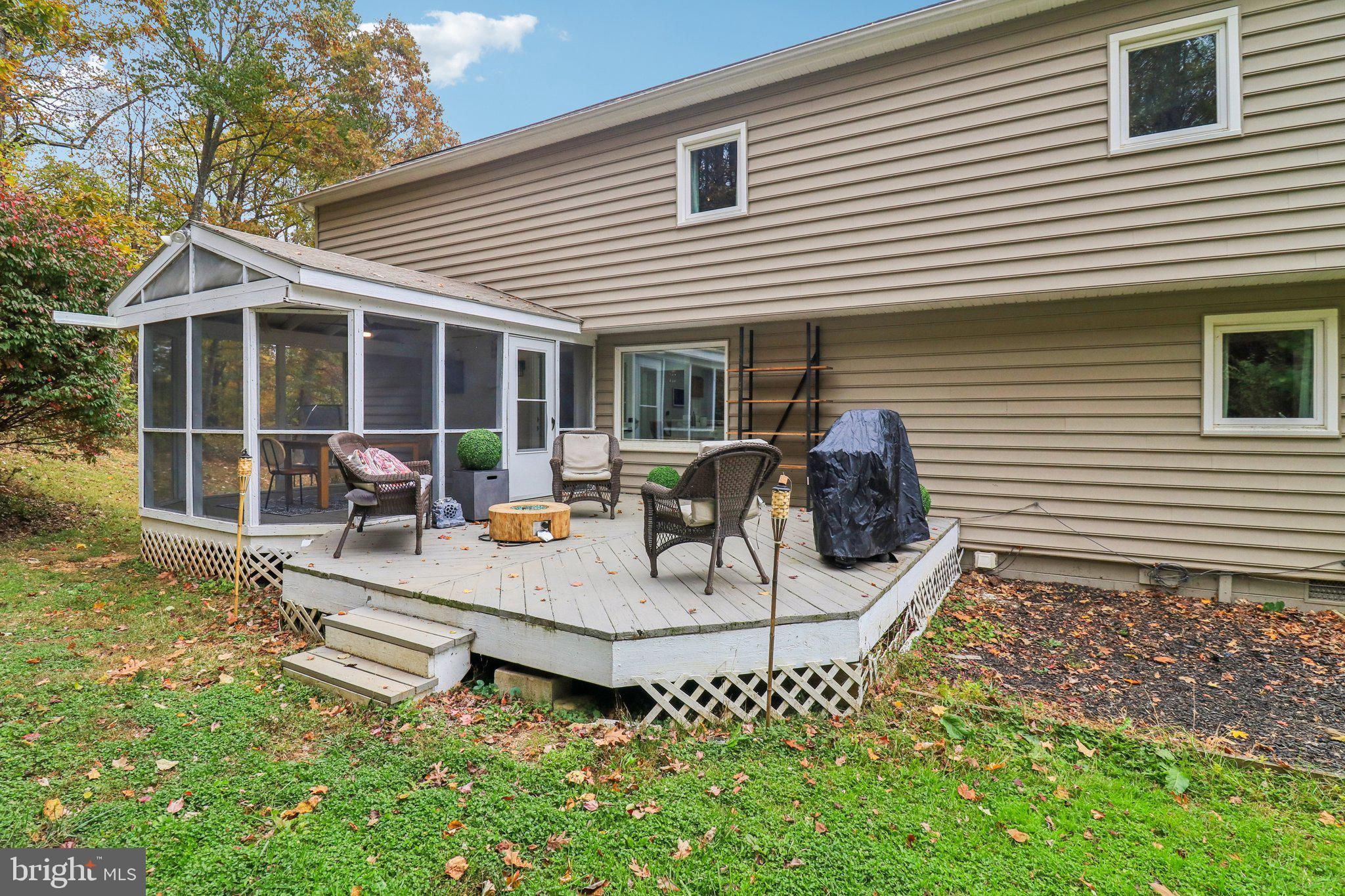 9830 Wineberry Road Marshall, VA 20115 - Photo 78 of 105 a view of a house with backyard and sitting area