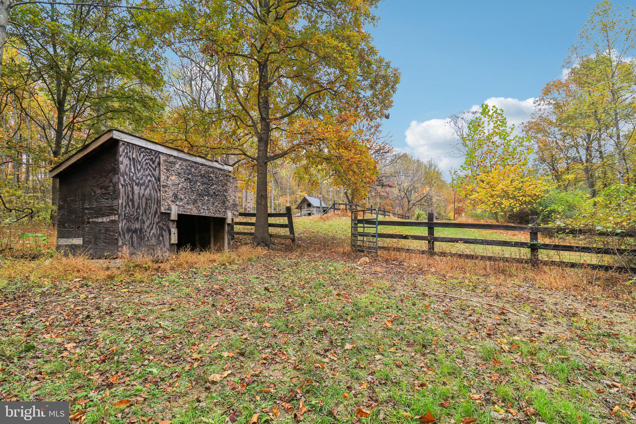 9830 Wineberry Road Marshall, VA 20115 - Photo 86 of 105 a view of backyard with wooden fence