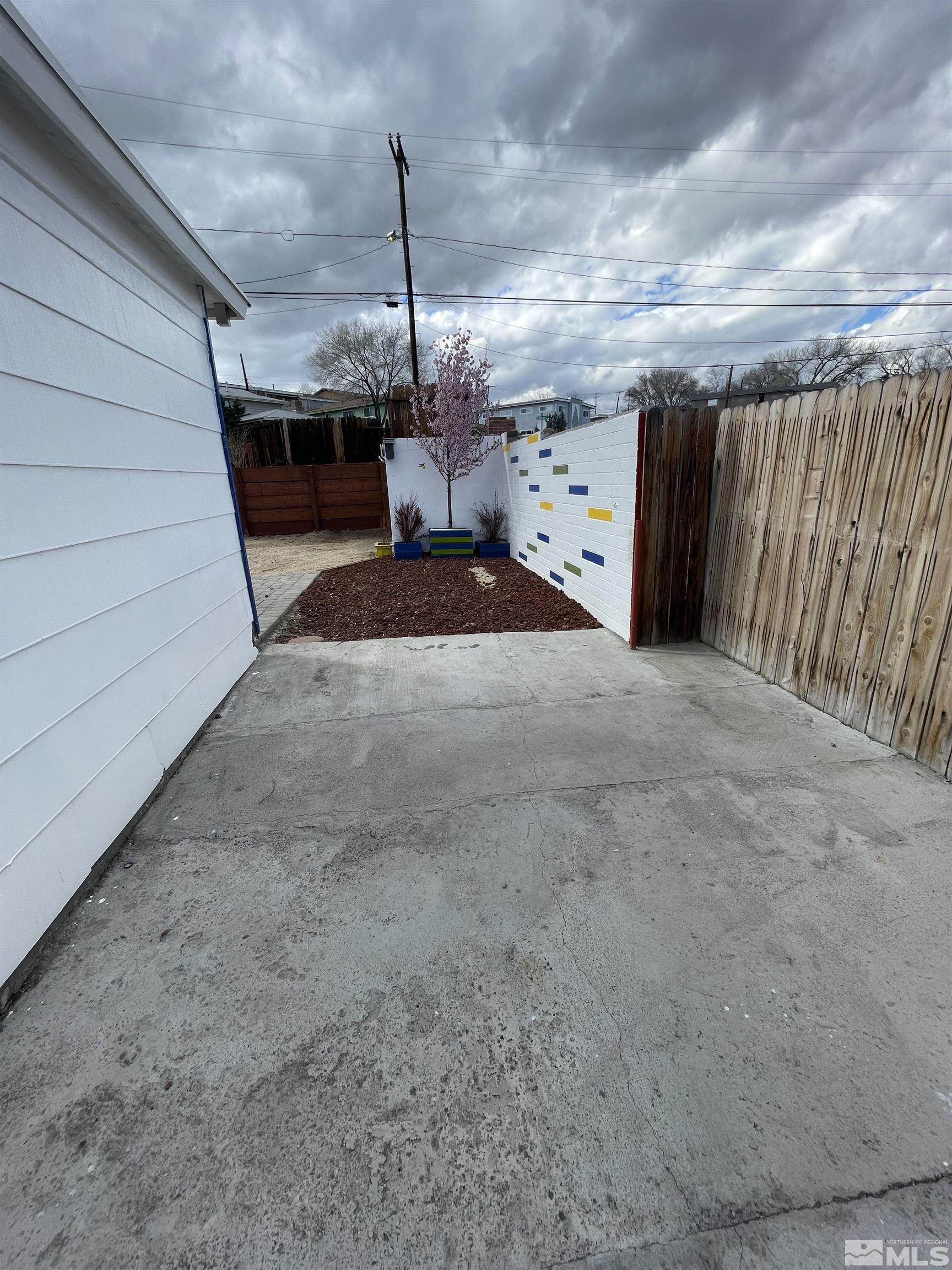 1913 Wilder Street Reno, NV 89512 - Photo 21 of 23 a view of a terrace with storage