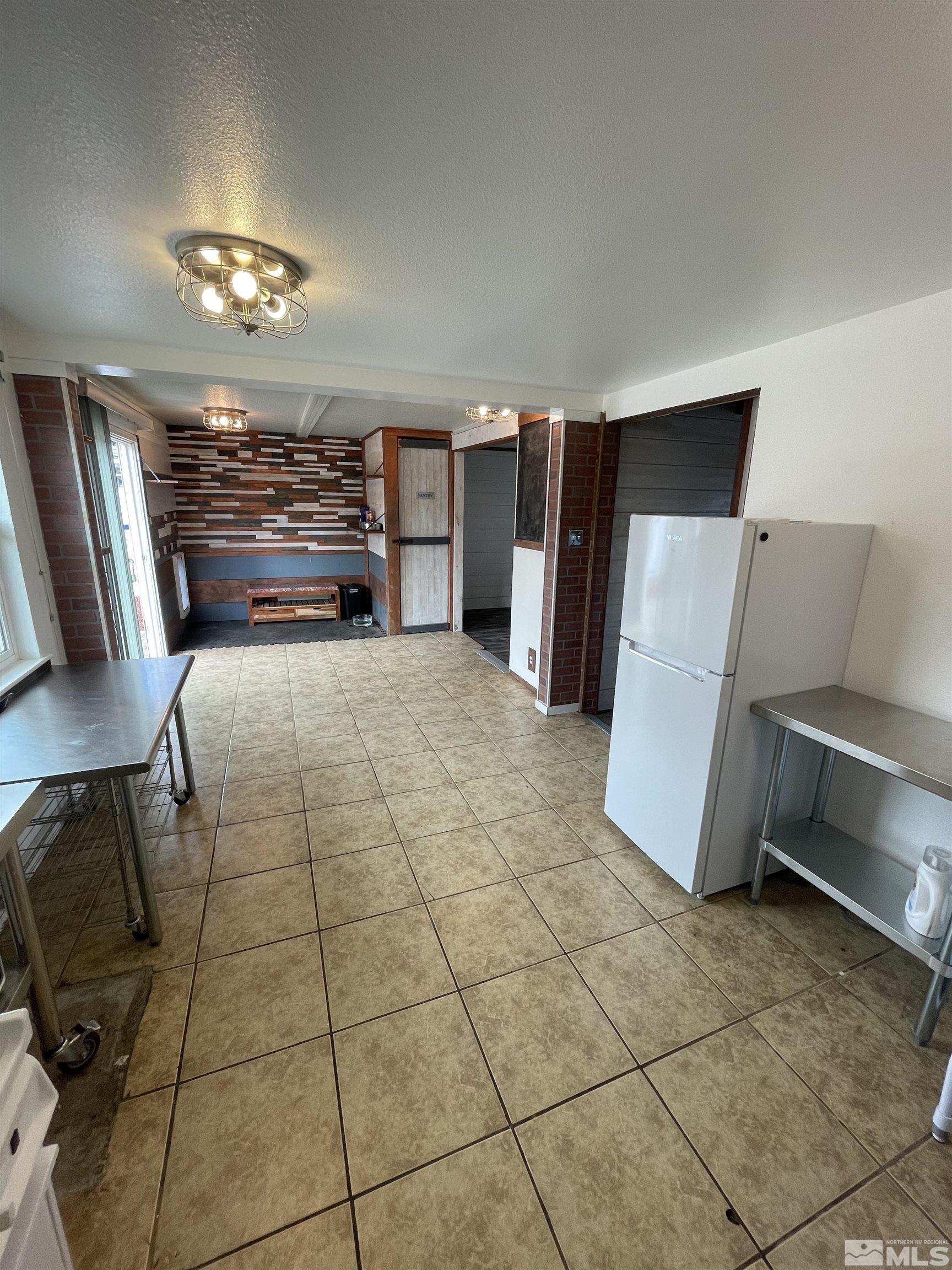 1913 Wilder Street Reno, NV 89512 - Photo 8 of 23 a view of a livingroom with furniture and chandelier