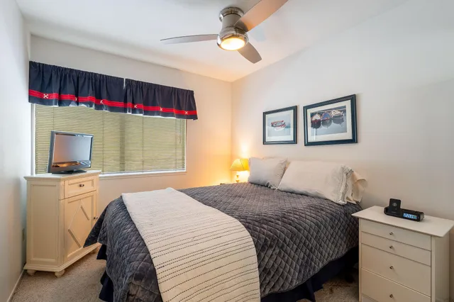 an aerial view of residential houses and outdoor space