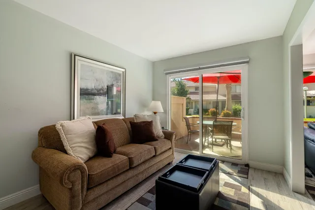 a kitchen with a refrigerator and a sink