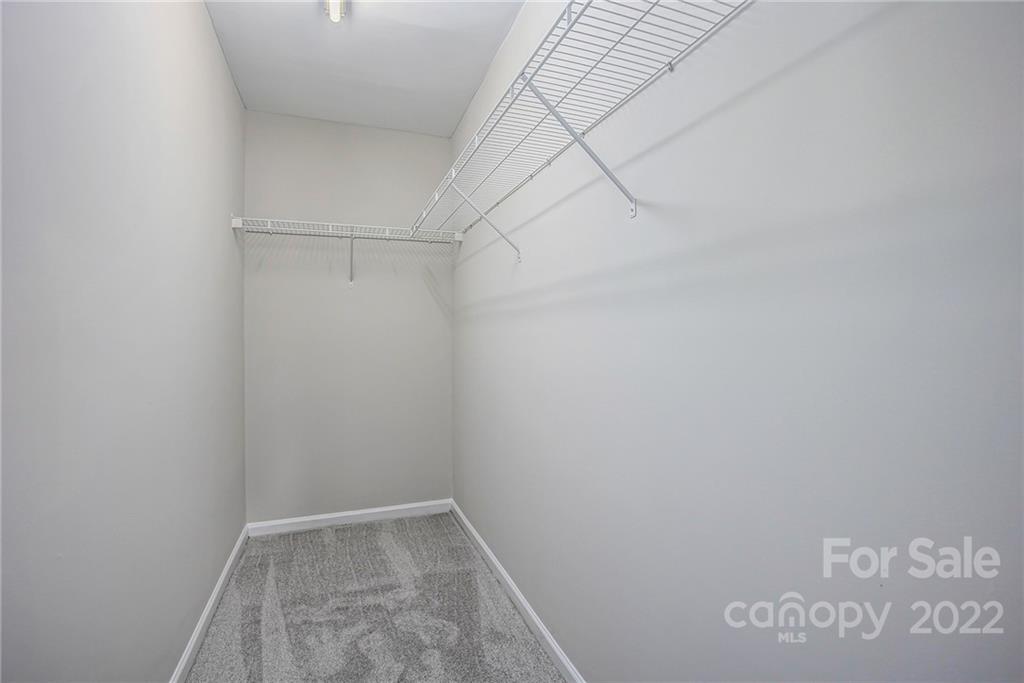 16852 Timber Crossing Road Charlotte, NC 28213 - Photo 13 of 31 a view of small space with racks on the wall