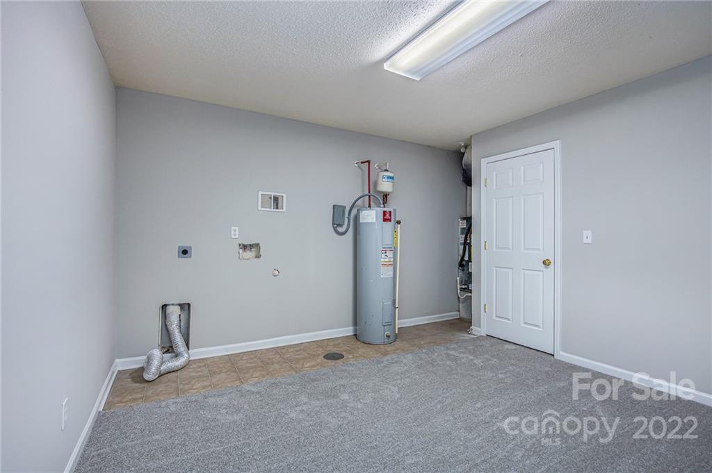 16852 Timber Crossing Road Charlotte, NC 28213 - Photo 26 of 31 a view of a livingroom with an empty space