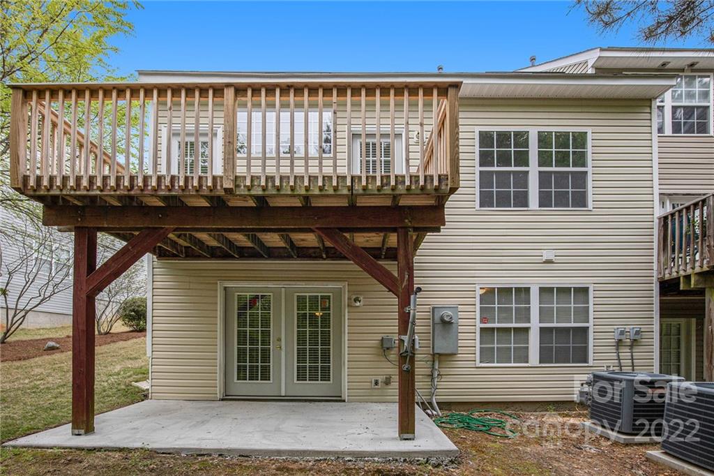 16852 Timber Crossing Road Charlotte, NC 28213 - Photo 28 of 31 a front view of a house with a balcony