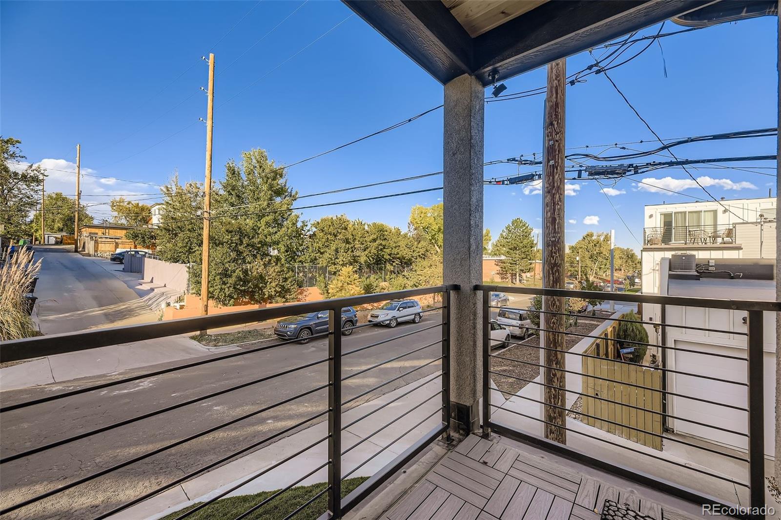 3850 West 13th Avenue Denver, CO 80204 - Photo 12 of 32 a view of a balcony with wooden floor