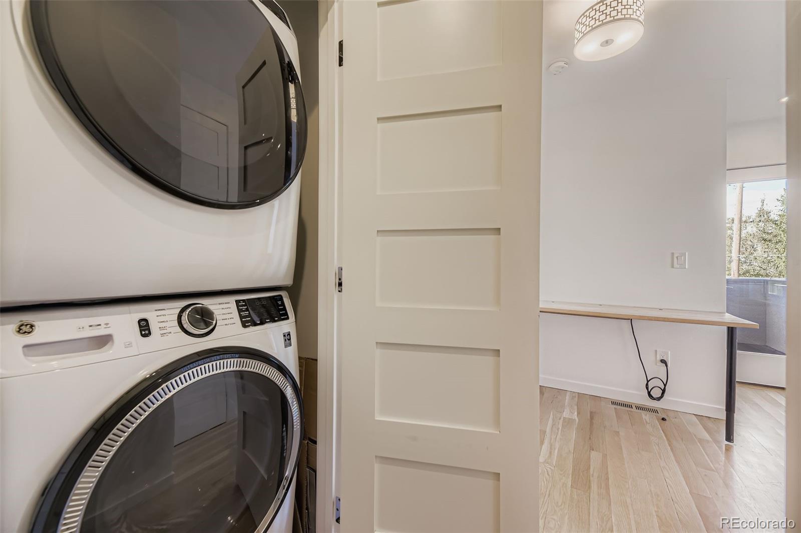 3850 West 13th Avenue Denver, CO 80204 - Photo 18 of 32 a utility room with dryer and washer