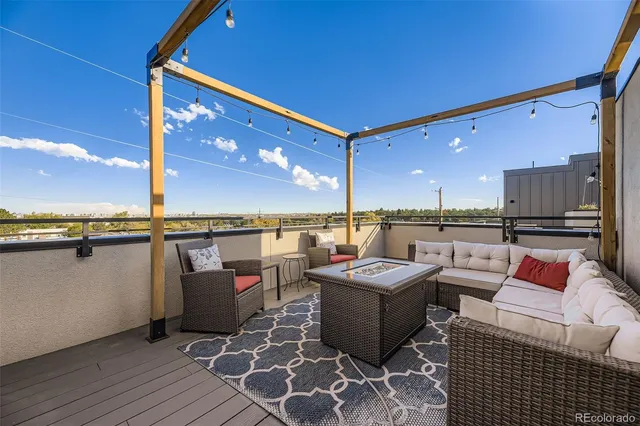 a view of swimming pool with furniture