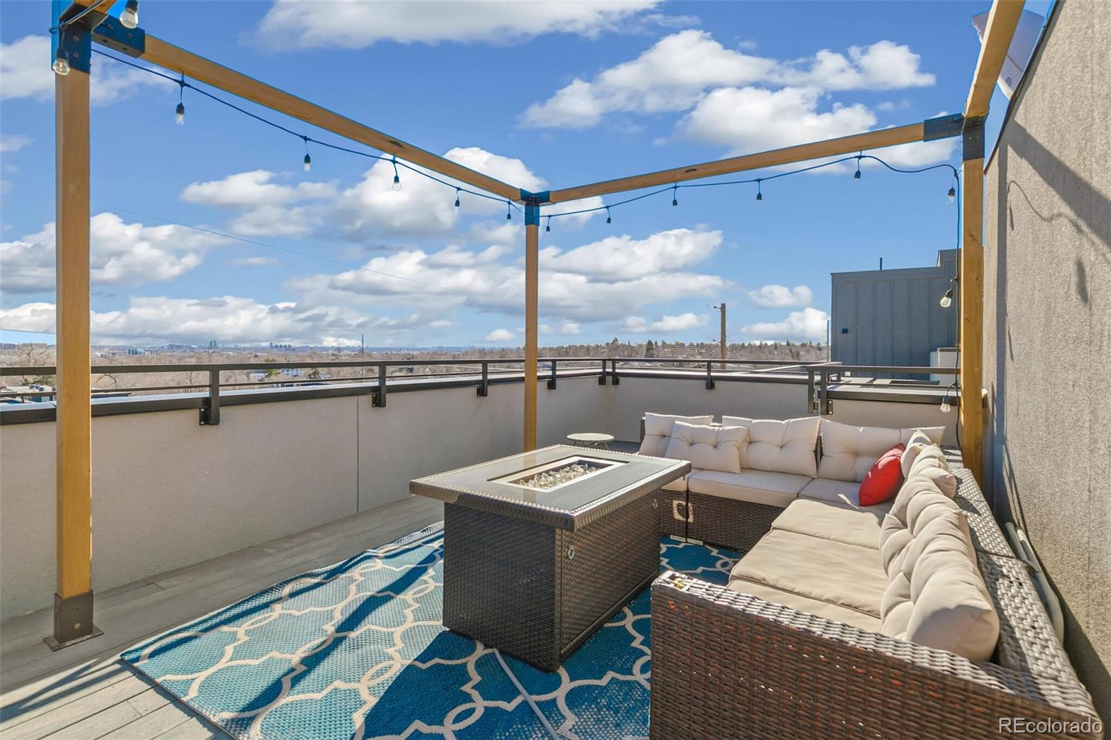 3850 West 13th Avenue Denver, CO 80204 - Photo 22 of 32 a living room with furniture and a floor to ceiling window