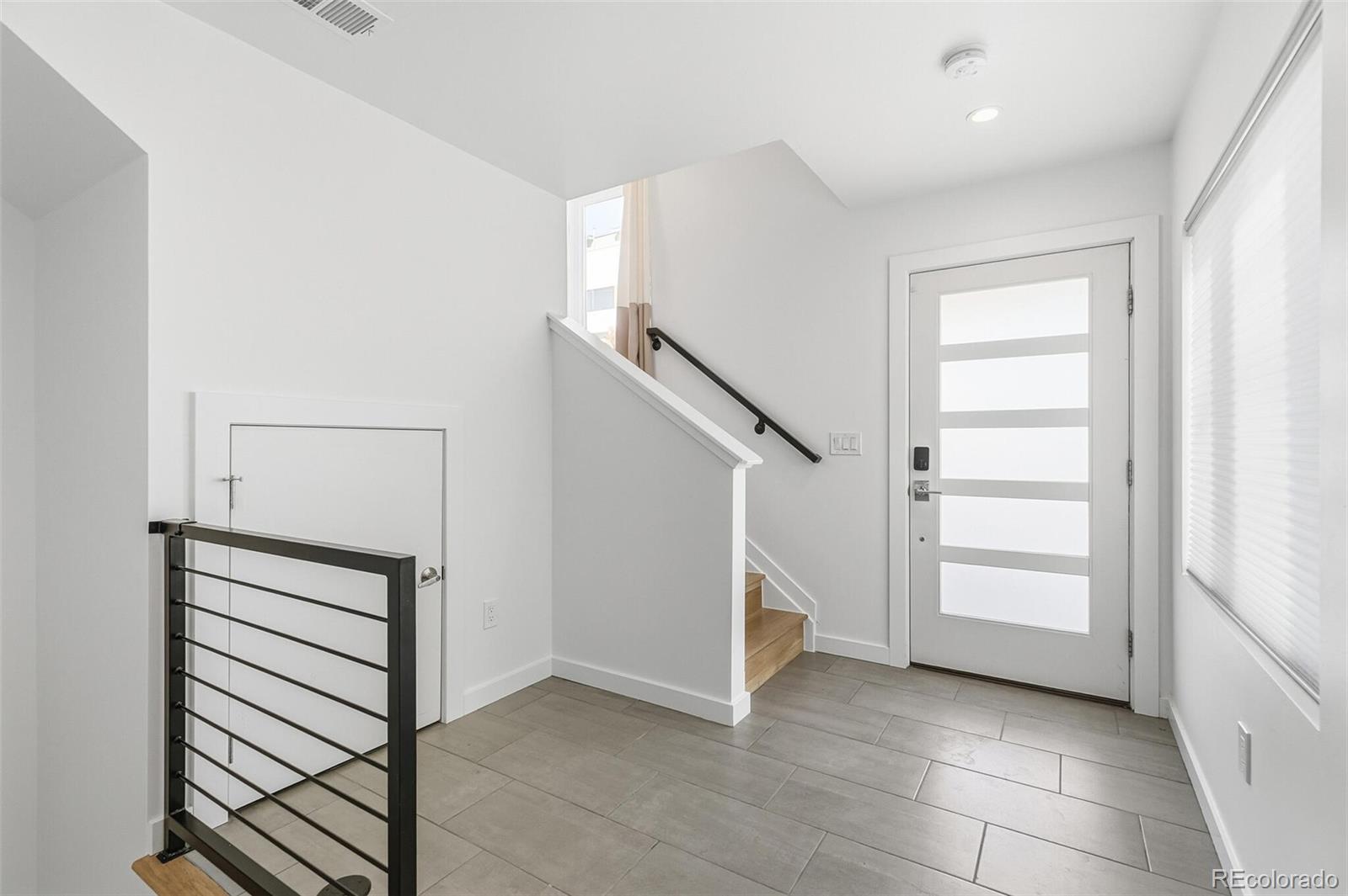 3850 West 13th Avenue Denver, CO 80204 - Photo 25 of 32 a view of a hallway view with staircase