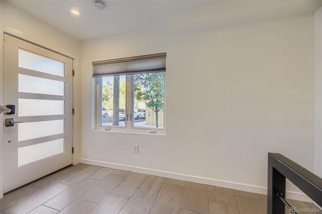 a view of entryway with wooden floor