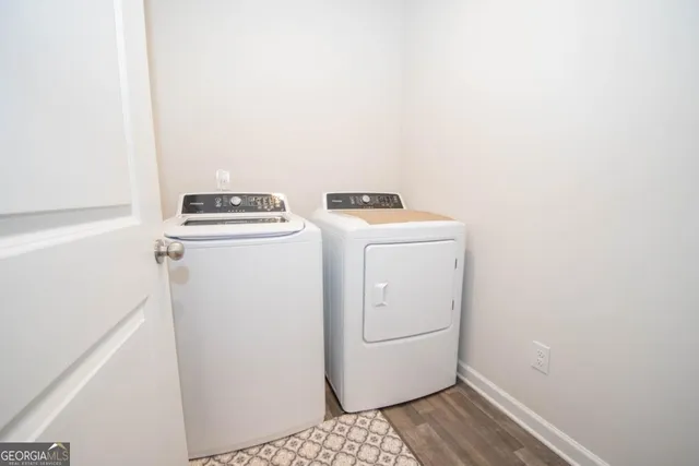 a utility room with dryer and washer