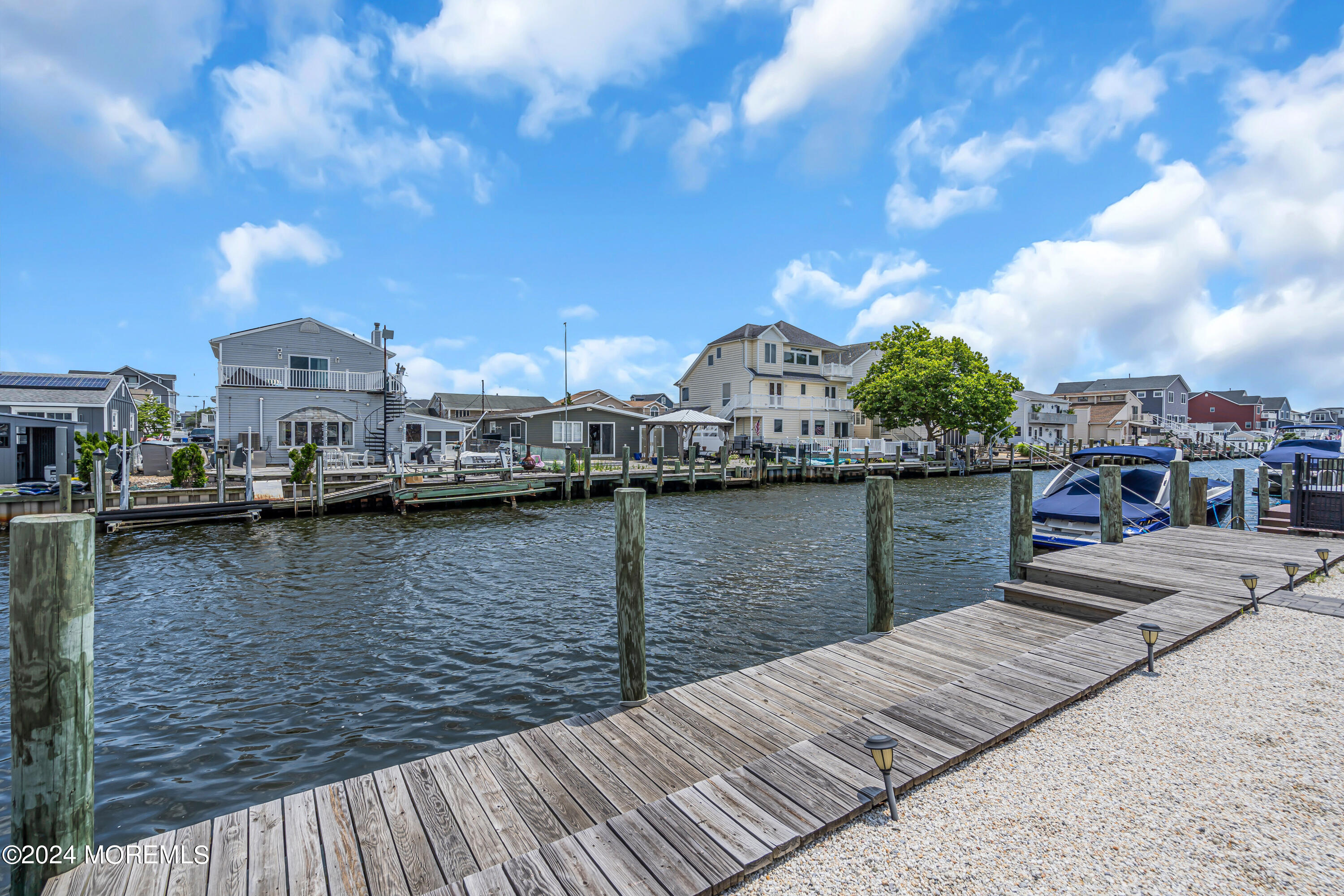 31 Neptune Road Toms River, NJ 08753 - Photo 44 of 84 a view of a lake and outdoor space