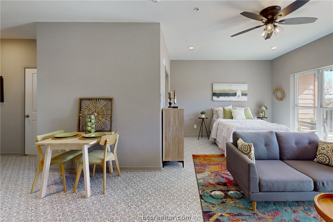 101 West 33rd Street, Unit 102 Bryan, TX 77803 - Photo 7 of 11 a living room with furniture and a rug