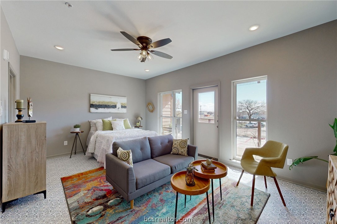101 West 33rd Street, Unit 102 Bryan, TX 77803 - Photo 8 of 11 a living room with furniture and a window