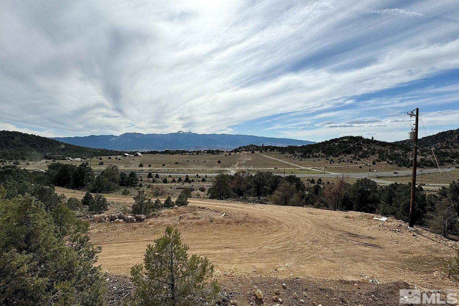 330 East 5 Mile Road, Unit 33 Reno, NV 89521 - Photo 12 of 15 a view of a lake with a mountain