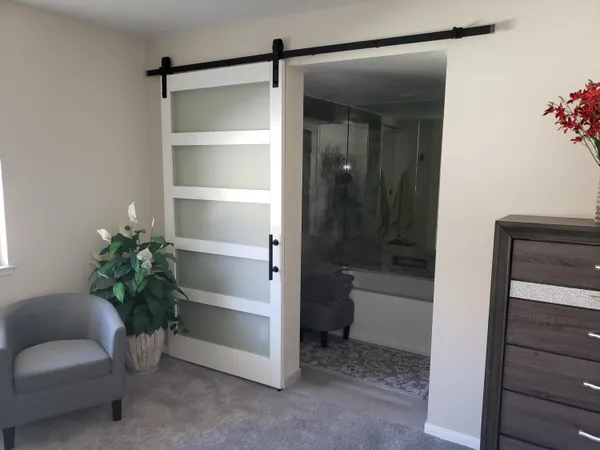 a room with a closet and a couch