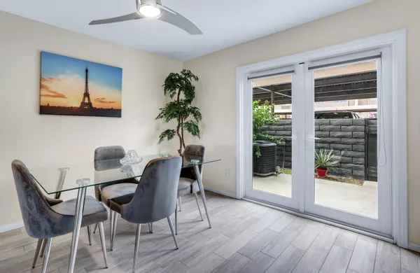 a view of a livingroom with furniture and window