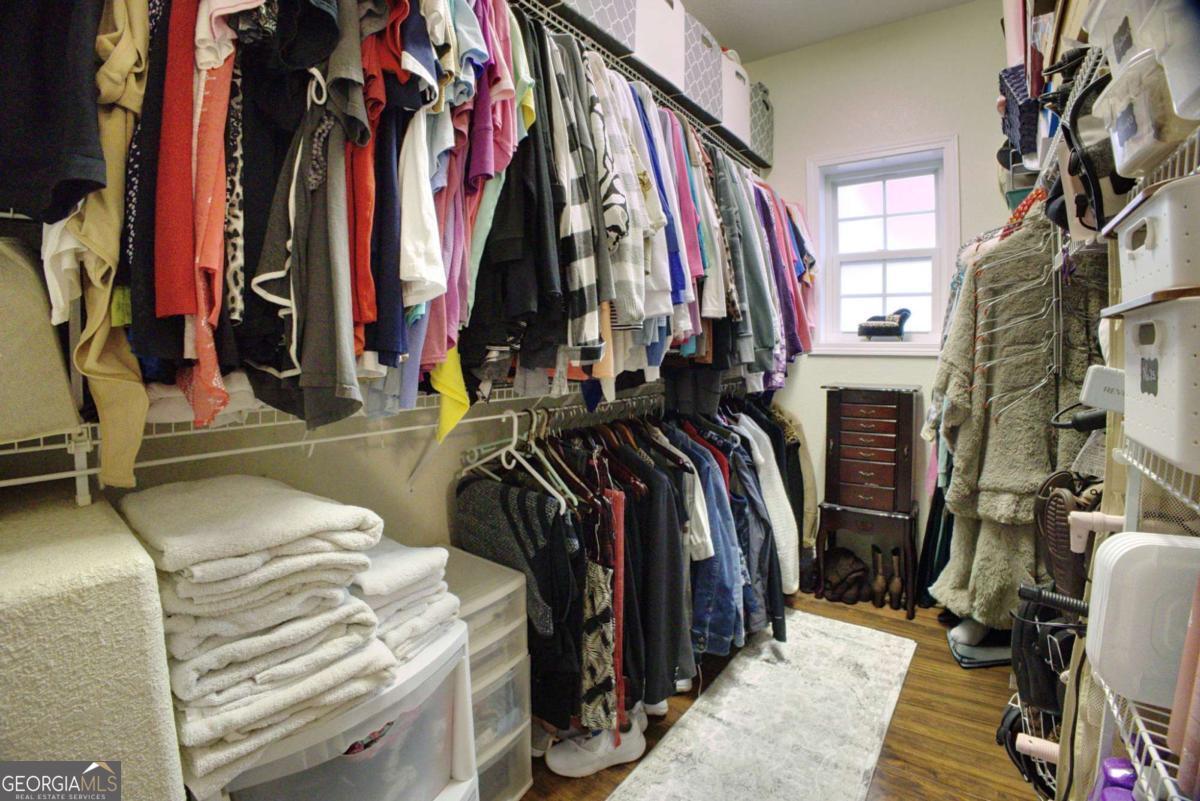 394 Crawford Road, Unit TRK Blairsville, GA 30512 - Photo 25 of 78 a view of walk in closet with clothes
