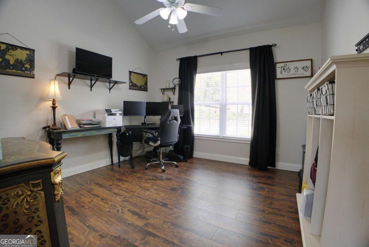 394 Crawford Road, Unit TRK Blairsville, GA 30512 - Photo 32 of 78 a view of a workspace with furniture and a window