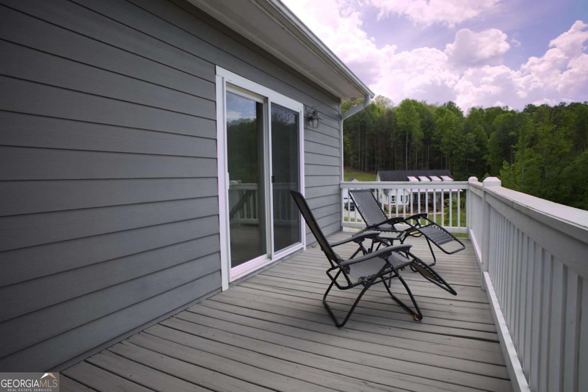 394 Crawford Road, Unit TRK Blairsville, GA 30512 - Photo 35 of 78 a view of a terrace with furniture