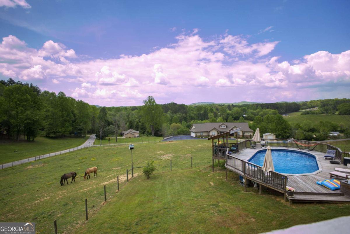 394 Crawford Road, Unit TRK Blairsville, GA 30512 - Photo 36 of 78 a view of a swimming pool with a yard