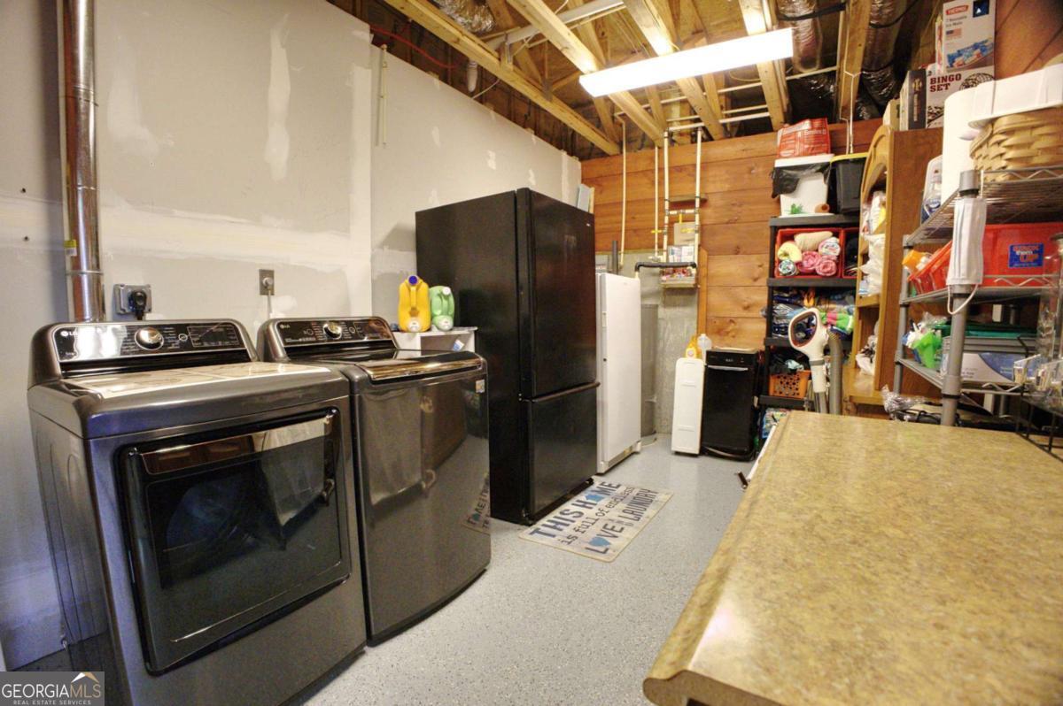 394 Crawford Road, Unit TRK Blairsville, GA 30512 - Photo 42 of 78 a kitchen with stainless steel appliances granite countertop a stove a refrigerator and a oven