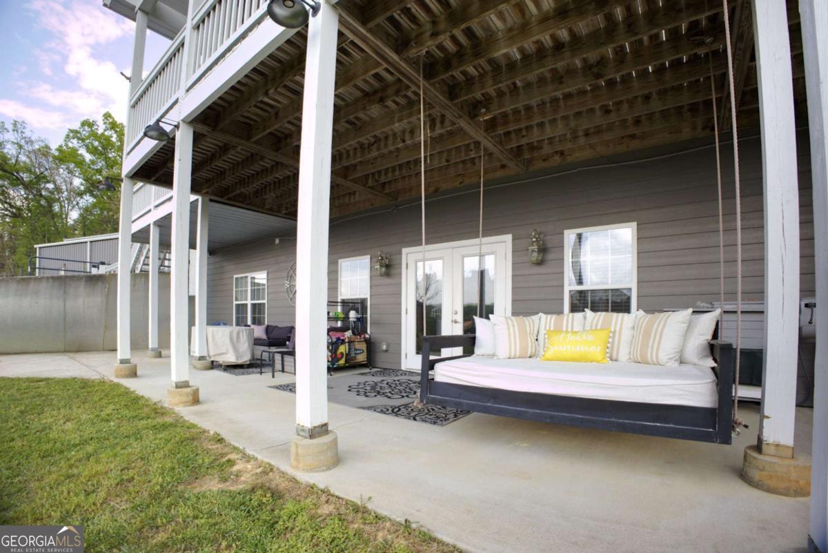 394 Crawford Road, Unit TRK Blairsville, GA 30512 - Photo 50 of 78 a view of a patio with swimming pool table and chairs