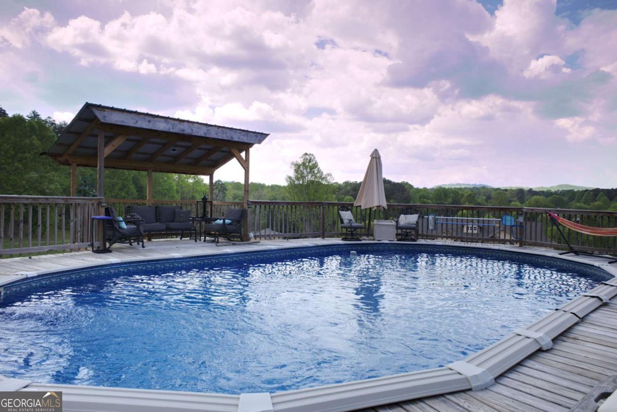 394 Crawford Road, Unit TRK Blairsville, GA 30512 - Photo 56 of 78 a view of a swimming pool with a yard