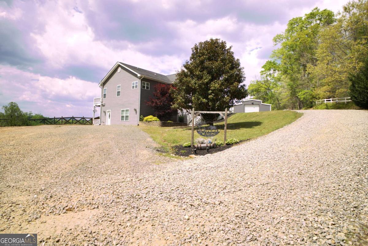 394 Crawford Road, Unit TRK Blairsville, GA 30512 - Photo 72 of 78 a view of a house with backyard and sitting area