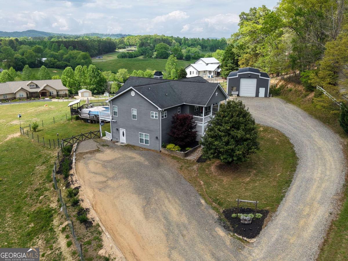 394 Crawford Road, Unit TRK Blairsville, GA 30512 - Photo 74 of 78 an aerial view of a house with garden space and street view
