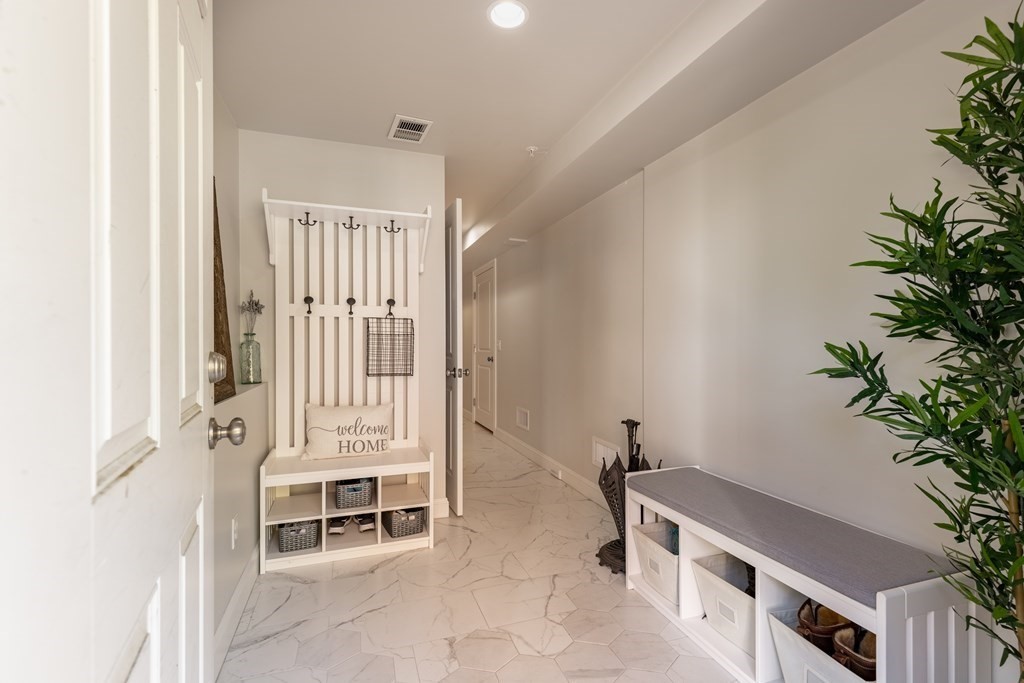 176 Main Street, Unit 3 Medway, MA 02053 - Photo 22 of 28 a room with table and chairs