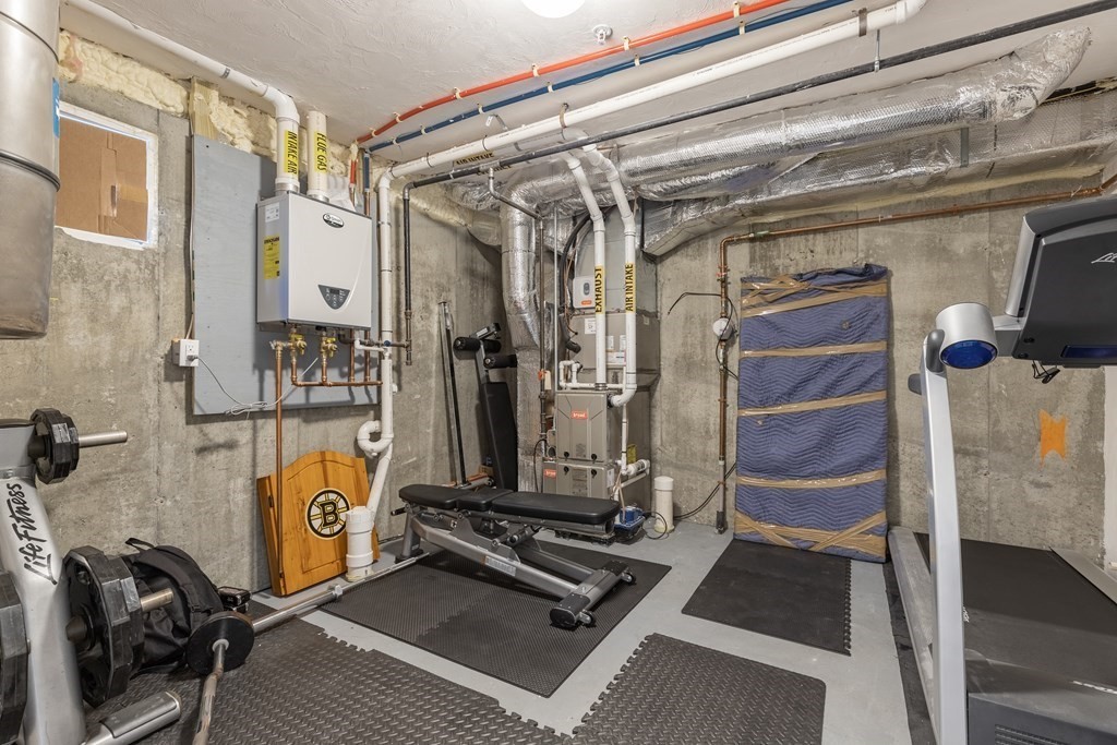 176 Main Street, Unit 3 Medway, MA 02053 - Photo 24 of 28 a view of a room with gym equipment