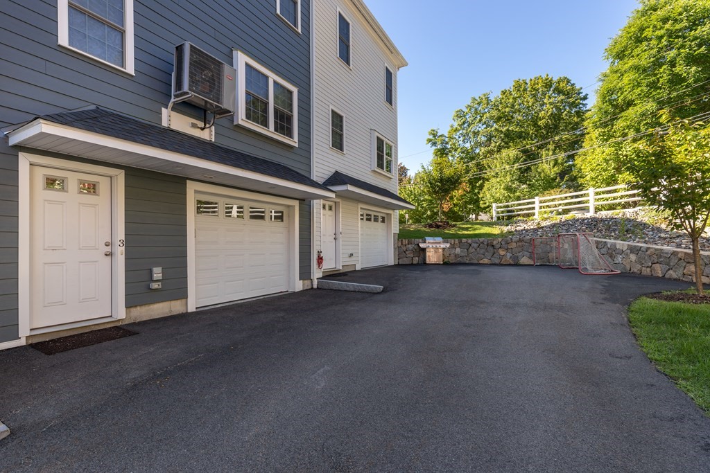176 Main Street, Unit 3 Medway, MA 02053 - Photo 27 of 28 a view of a house with a street