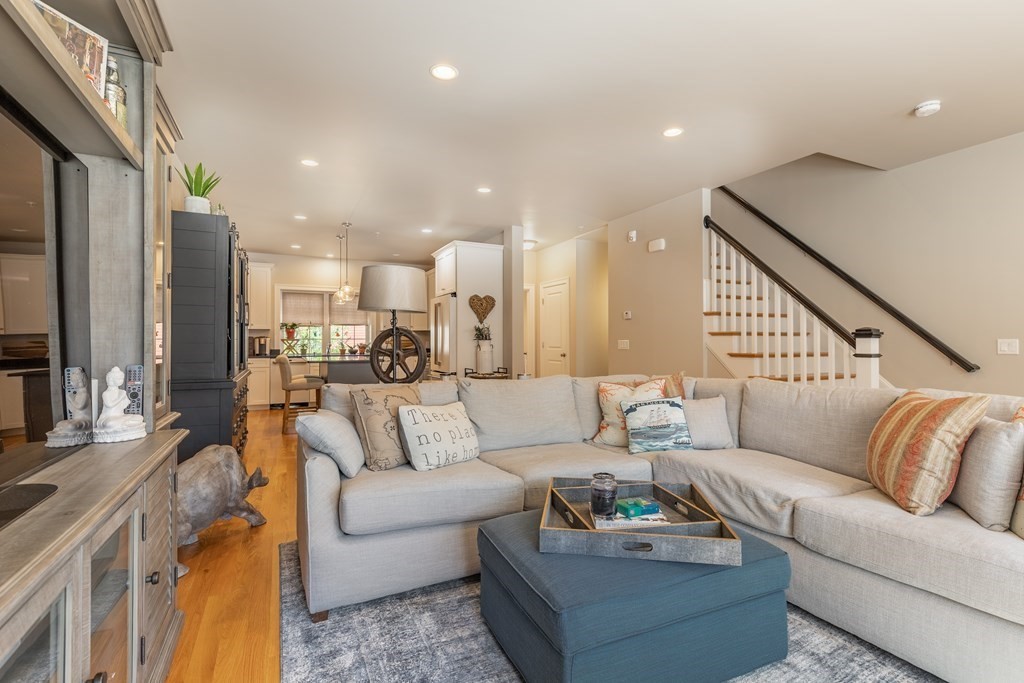 176 Main Street, Unit 3 Medway, MA 02053 - Photo 3 of 28 a living room with furniture and a large window