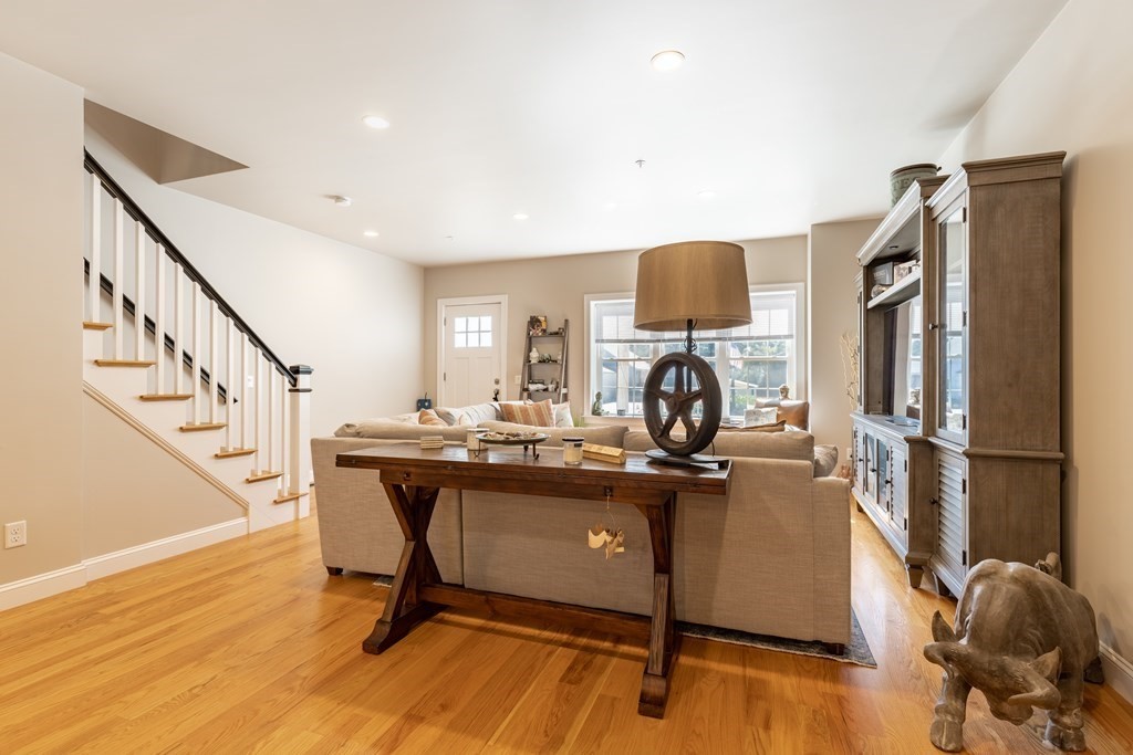 176 Main Street, Unit 3 Medway, MA 02053 - Photo 5 of 28 a view of a workspace with furniture and wooden floor