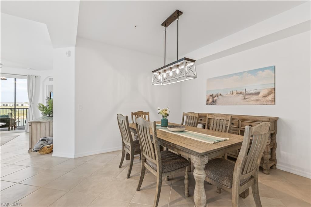 43997 Boardwalk Loop, Unit 1821 Babcock Ranch, FL 33982 - Photo 5 of 14 a view of a dining room with furniture