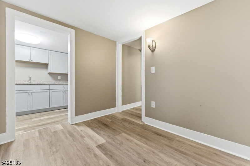 58 Bridge Street Milford, NJ 08848 - Photo 12 of 13 a view of an empty room with closet and a window