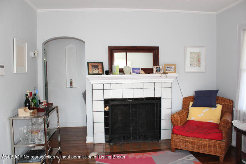 217 Malverne Road West Palm Beach, FL 33405 - Photo 6 of 9 a living room with furniture and a fireplace